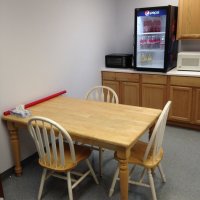 The station kitchen and dining area, where members share meals during their stay.